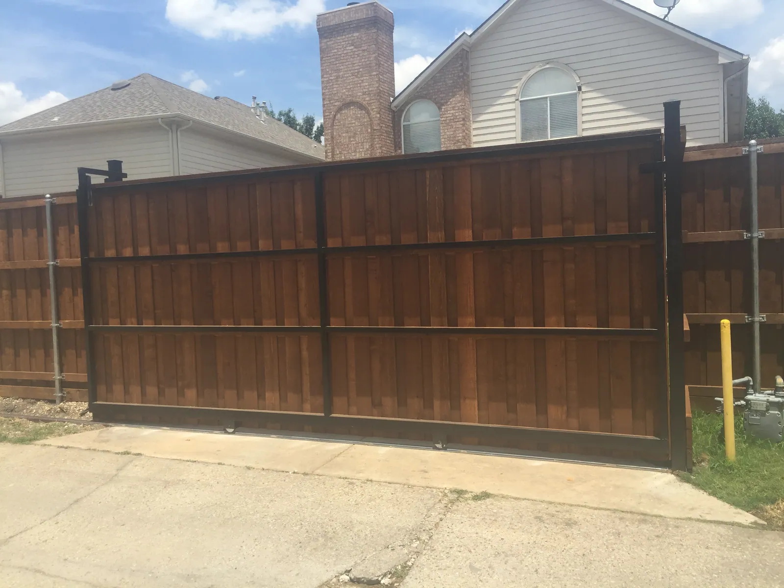 Wood electric gate frame — Fence Max Texas project