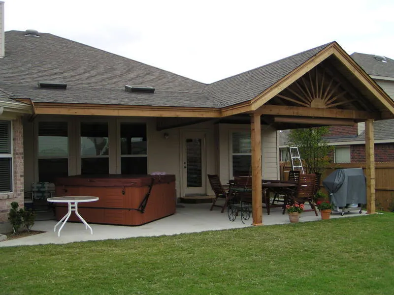 Single gable patio cover with sunburst design — Fence Max Texas project