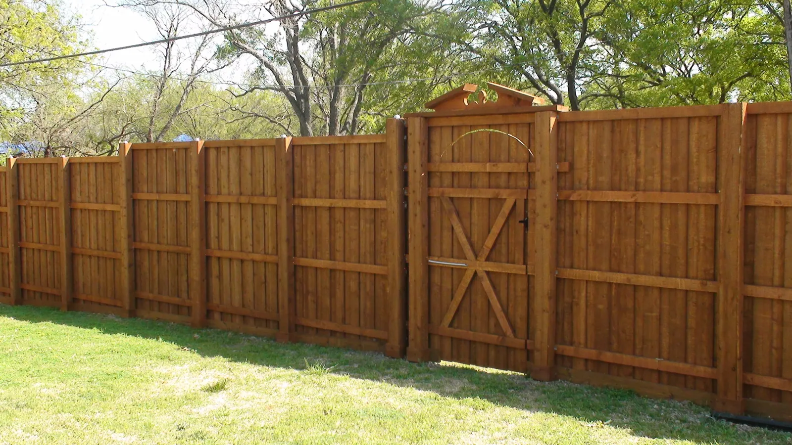 Board on board fence back side view with boxed post — Fence Max Texas project