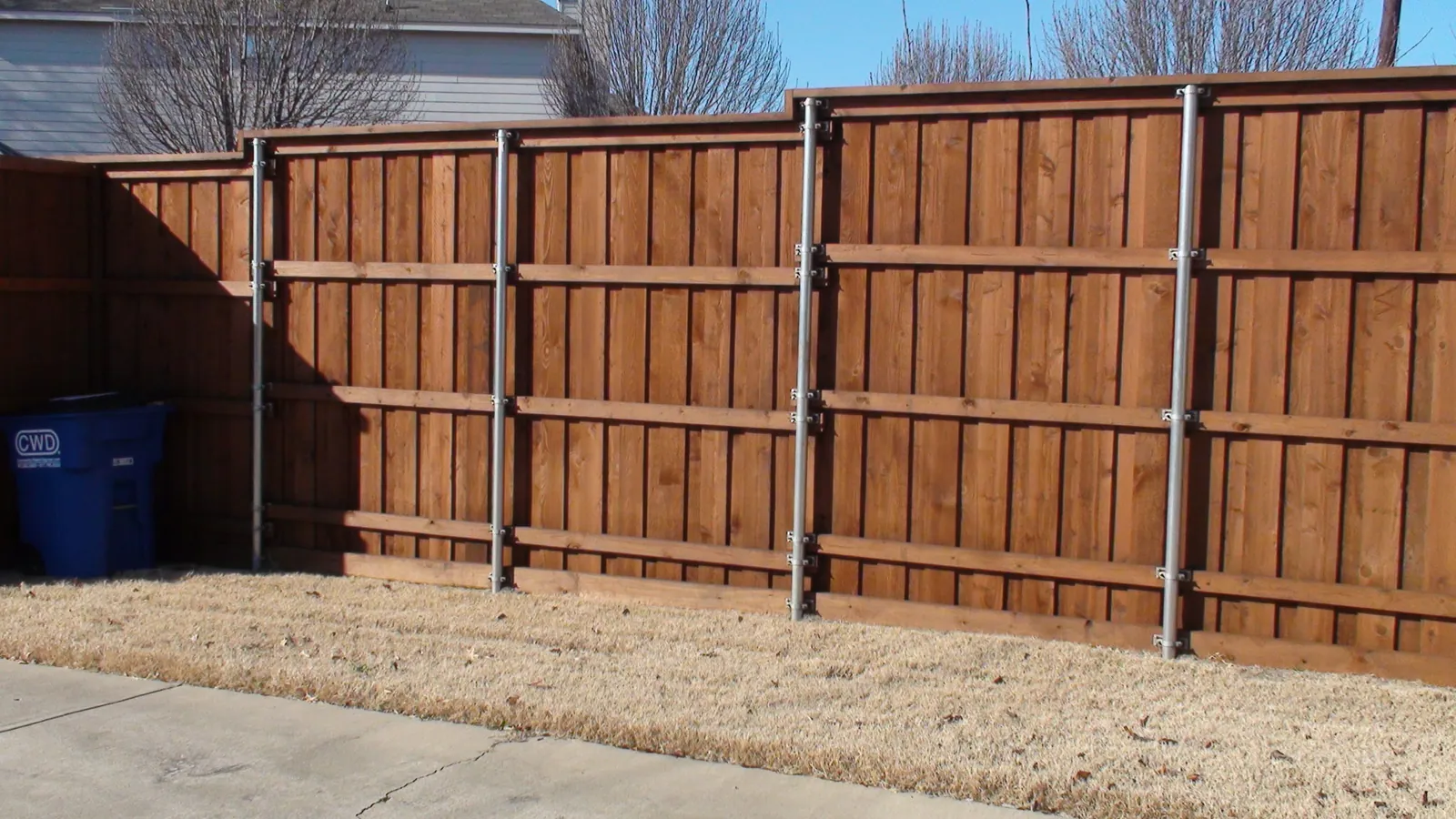 Board on board fence with step level — Fence Max Texas project