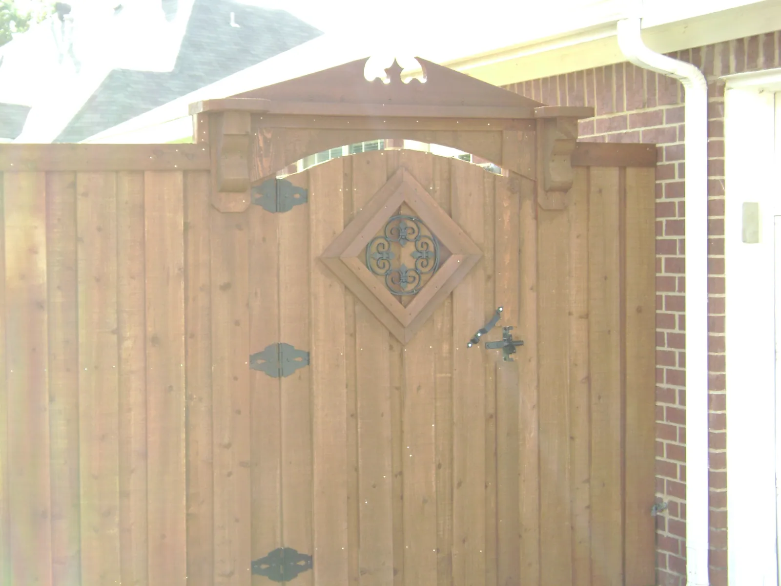 Wood gate pediment top corbles solid insert — Fence Max Texas project