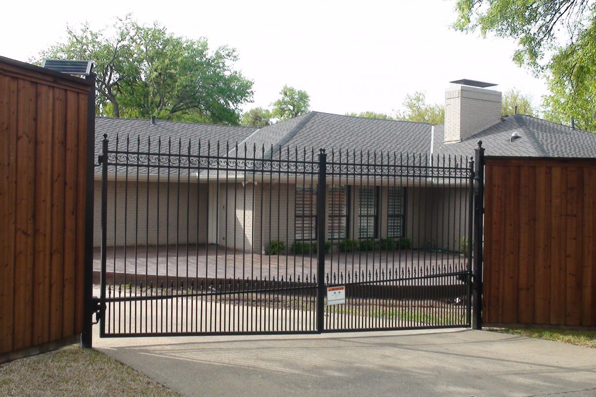 311 - Custom double iron swing gate - extended pickets. finials, puppy panels & b_b wood fence with double trim 2