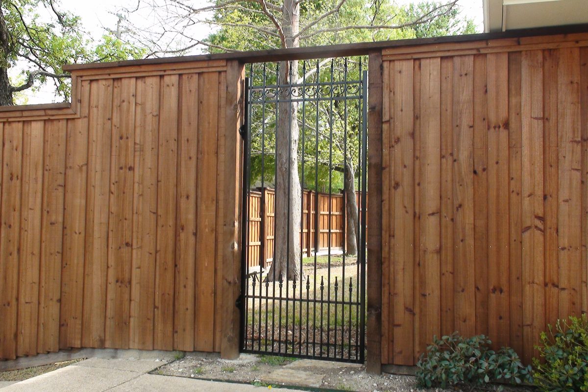 606 - Custom iron walk in gate on b_b wood fence 2